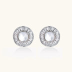 Round white gold-plated stud earrings with mother of pearl center and baguette crystal halo surround, 16.2mm diameter.